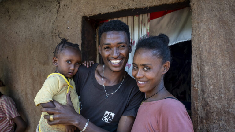 Meskerem Birhanu with her husband and child.