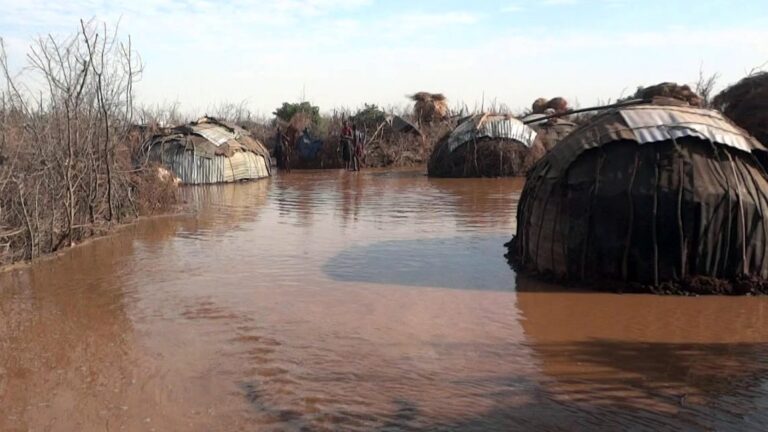 Huts flooded by water.